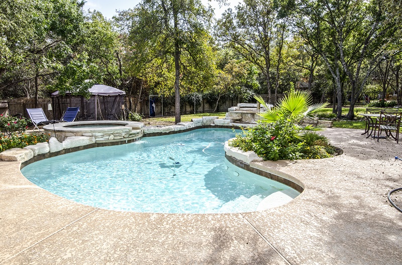 Swimming pool installation from Kohler Lawn & Outdoor puts a summer paradise right in your own backyard.